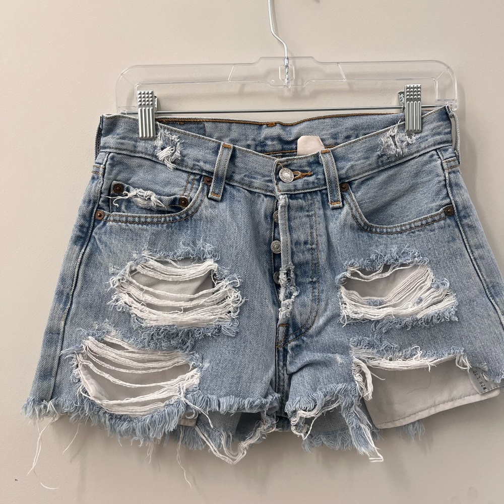 Levi’s high rise distressed denim shorts